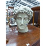 A COMPOSTION BUST OF DAVID AFTER THE ANTIQUE.