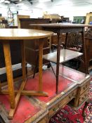 AN ARTS AND CRAFTS MAHOGANY TABLE OF TWO RECTANGULAR TIERS TOGETHER WITH AN OAK CIRCULAR TABLE. Dia.