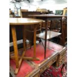 AN ARTS AND CRAFTS MAHOGANY TABLE OF TWO RECTANGULAR TIERS TOGETHER WITH AN OAK CIRCULAR TABLE. Dia.