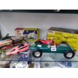 A BOXED CORGI UFO INTERCEPTER, A CORGI PINK PANTHER CAR AND A LINCOLN RACING CAR, ALL BATTERY