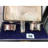 A HALLMARKED SILVER THREE PIECE CRUET SET CASED, DATED 1904, LONDON.