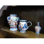 A JAPANESE IMARI MUG AND TWO VASES.