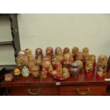 A LARGE QUANTITY OF RUSSIAN STACKING DOLLS.