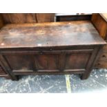 AN 18th C. OAK COFFER WITH A THREE PANELLED FRONT. W 118 x d 53 x H 70cms.
