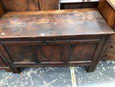 AN 18th C. OAK COFFER WITH A THREE PANELLED FRONT. W 118 x d 53 x H 70cms.