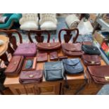 A COLLECTION OF HANDBAGS AND PURSES TO INCLUDE , THE BRIDGE, OSPREY ETC (15)