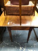 A 19th C. MAHOGANY PEMBROKE TABLE WITH A DRAWER TO ONE END ABOVE TURNED CYLINDRICAL LEGS TAPERING TO