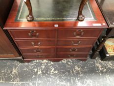 A MODERN MAHOGANY WRITING TABLE, THE LEATHER INSET TOP ABOVE FOUR FILING DRAWERS. W 94 x D 61 x H