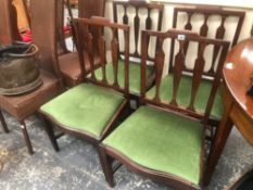 A SET OF FOUR LATE 19th C. MAHOGANY CHAIRS, EACH WITH THREE BALUSTER SPLATS ABOVE DROP IN SEATS ON