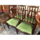 A SET OF FOUR LATE 19th C. MAHOGANY CHAIRS, EACH WITH THREE BALUSTER SPLATS ABOVE DROP IN SEATS ON