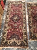 TWO MACHINE MADE PERSIAN DESIGN SMALL RUNNERS LARGEST 230 x 93cms.