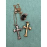 TWO ANTIQUE CROSS PENDANTS, UNHALLMARKED, ASSESSED AS 9ct GOLD, ONE SUSPENDED ON A 9ct GOLD CHAIN,