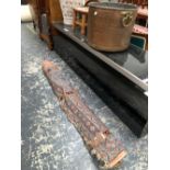 A 20th C. COFFEE TABLE, THE BLACK GLASS TOP WITHIN A METAL FRAME ABOVE A LOWER TIER OF THREE