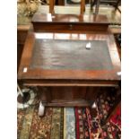 A 19th C. ROSEWOOD DAVENPORT DESK, THE FALL COMPARTMENT OVER A CUPBOARD, A COMPARTMENT FOR WRITING