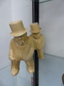 TWO BOVEY POTTERY OATMEAL GLAZED FIGURES OF WINSTON CHURCHILL