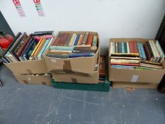 A QUANTITY OF VARIOUS BOOKS.