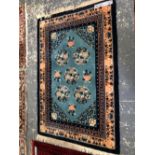 A GOOD QUALITY CHINESE RUG 190 x 125cms