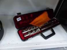 A CASED FLUTE BY HERNALS.