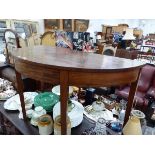 A GEORGE III MAHOGANY DEMILUNE TABLE, THE LINE INLAID APRON ABOVE TAPERING SQUARE LEGS. W 122 x D 60