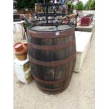 A LARGE ANTIQUE IRON BOUND BARRELL