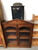 A 19th C. MAHOGANY CABINET WITH GLAZED DOORS BELOW A TRIANGULAR PEDIMENT. W 81 x D 30 x H 100cms.