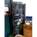 A CHINESE BLACK LACQUER FOUR FOLD SCREEN INLAID IN SPECIMEN STONES WITH CRANES, PINE, LINGZHIH