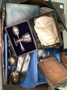 TWO EASTERN SLAVE BANGLES CONVERTED AS VESSELS, A FOLDING SILVER PHOTOFRAME, SILVER CARD CASE,