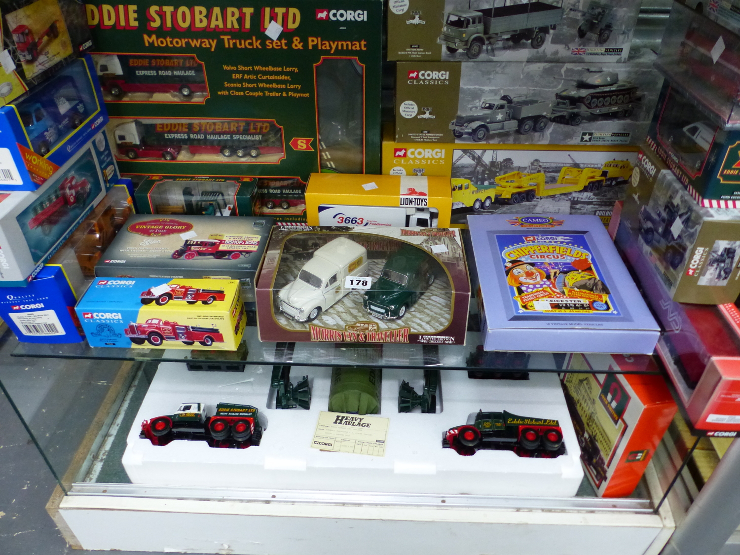 A COLLECTION OF BOXED DIE CAST TOYS TO INCLUDE TWO EDDIE STOBART TRUCK SETS, MAINLY BY CORGI