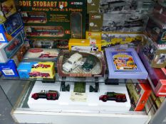 A COLLECTION OF BOXED DIE CAST TOYS TO INCLUDE TWO EDDIE STOBART TRUCK SETS, MAINLY BY CORGI