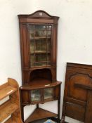 A LATE VICTORIAN SATIN WOOD CROSS BANDED AND LINE INLAID MAHOGANY CORNER CUPBOARD, THE CENTRAL SHELF