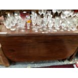 A 19th C. MAHOGANY RECTANGULAR DROP FLAP TABLE WITH A DRAWER TO EACH NARROW END, THE SQUARE LEGS