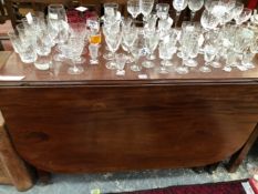 A 19th C. MAHOGANY RECTANGULAR DROP FLAP TABLE WITH A DRAWER TO EACH NARROW END, THE SQUARE LEGS