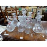 EIGHT VARIOUS DECANTERS.