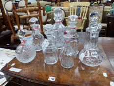 EIGHT VARIOUS DECANTERS.