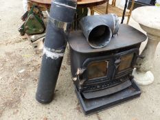 A CAST IRON WOOD BURNING STOVE