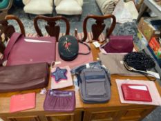 A LARGE RADLEY CROSS BODY BAG, TOGETHER WITH ANOTHER CROSS BODY, FOUR CLUTCH TYPE BAGS AND FOUR