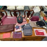 A LARGE RADLEY CROSS BODY BAG, TOGETHER WITH ANOTHER CROSS BODY, FOUR CLUTCH TYPE BAGS AND FOUR