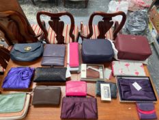 A COLLECTION OF PURSES SMALL BAGS AND EVENING BAGS TO INCLUDE TULA, FOSSIL, JOULES, LULU GUINNESS