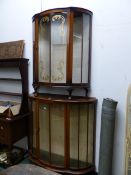 TWO 1940S GLAZED MAHOGANY DEMILUNE DISPLAY CABINETS, ONE WITH GILT DOORS, THE LARGER WITH CLEAR