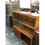 A MODERN MAHOGANY BOOK CASE, THE UPPER HALF WITH SLIDING GLASS DOORS OVER TWO SHELVES, THE BASE WITH