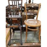 A CHILDS FOLDING HIGH CHAIR SUPPORTED ON IRON SPOKED WHEELS TOGETHER WITH A THONET TYPE SIDE CHAIR