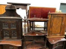 A CARVED OAK AND A STAINED PINE CORNER CUPBOARD TOGETHER WITH A MAHOGANY THREE SHELF WHATNOT