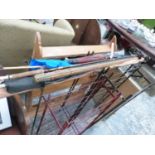 A COLLECTION OF VINTAGE FISHING RODS, A PARASOL, SWAGGER STICK ETC.