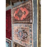 TWO PERSIAN TRIBAL RUGS 160 x 11cms and 152 x 116cms