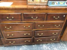 A 19th C. MAHOGANY SIDE CABINET, THE COFFER TOP ABOVE TWO BANKS OF THREE DRAWERS AND CASTER FEET.