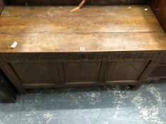AN 18th C. OAK COFFER THE THREE PANELS TO THE FRONT CARVED WITH DIAMONDS. W 130 x D 55 x H 67cms