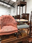 A VICTORIAN BUTTON UPHOLSTERED HOOP BACK ARMCHAIR, THE MAHOGANY LEGS ON CASTER FEET, A FOOT STOOL, A