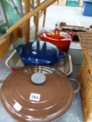 THREE LE CREUSET COVERED COOKING POTS AND A BAKING TRAY