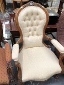 A VICTORIAN MAHOGANY AND A WALNUT SHOW FRAME ARMCHAIR TOGETHER WITH ANOTHER ARMCHAIR WITH BUTTON