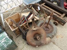 A VINTAGE CAST IRON BELLOWS, TOGETHER WITH A PAIR OF SMALL TRACTOR WHEELS ON AXLE, A VINTAGE PULL